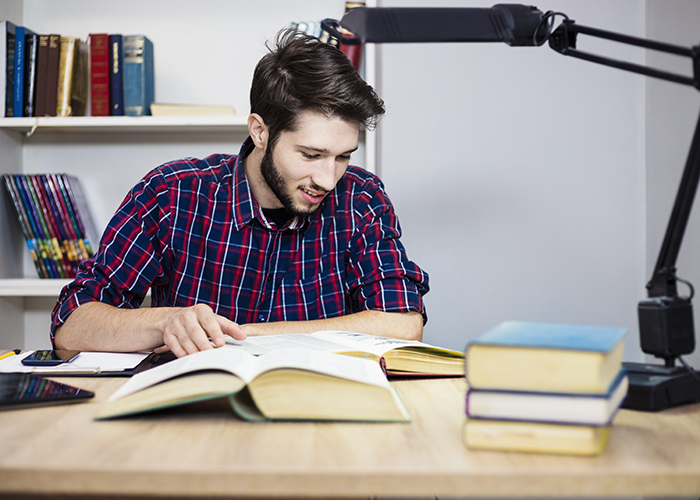 Man reading at desk
