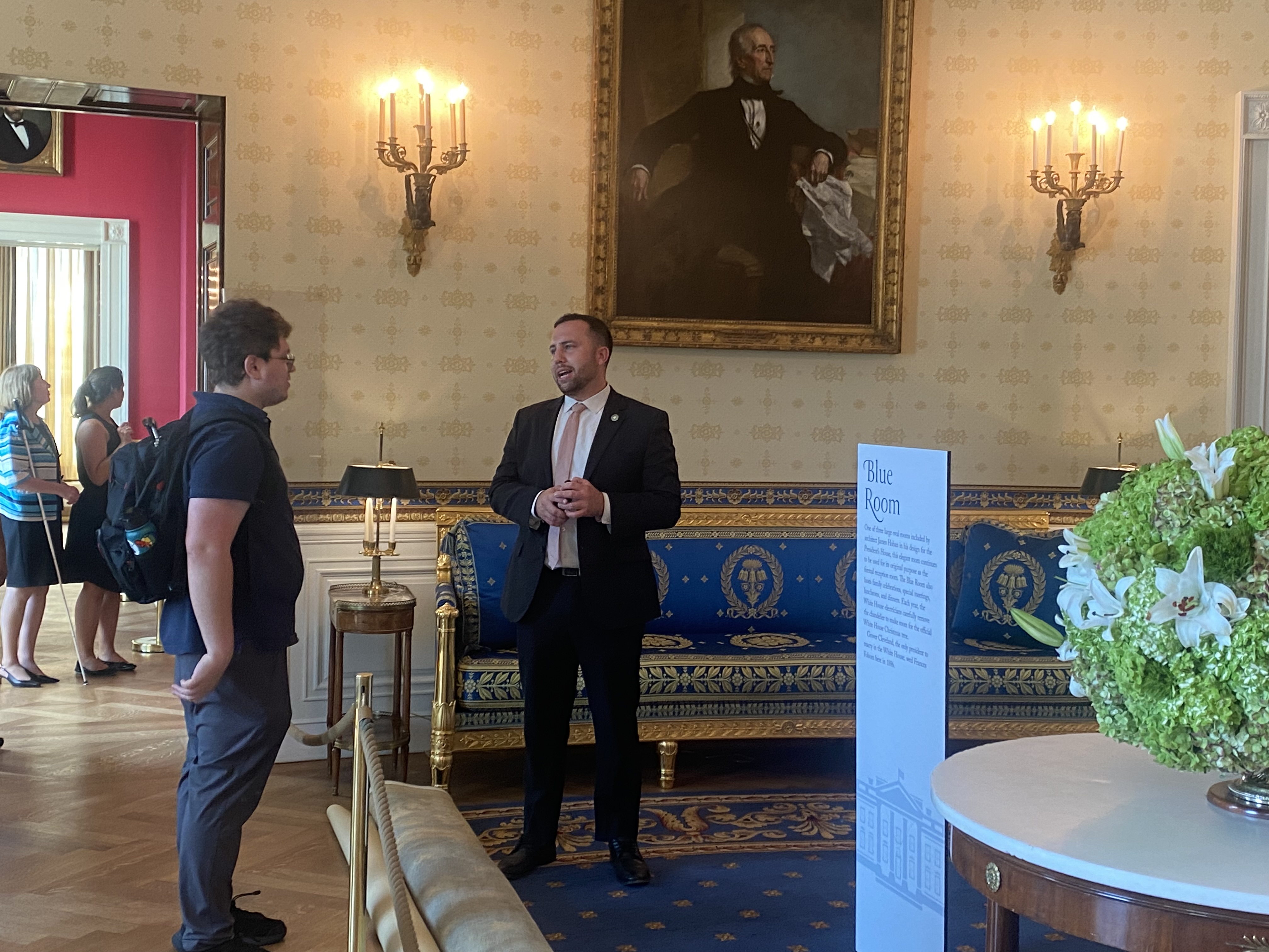 Daniel asking a White House staff person about the significance of the Blue Room.