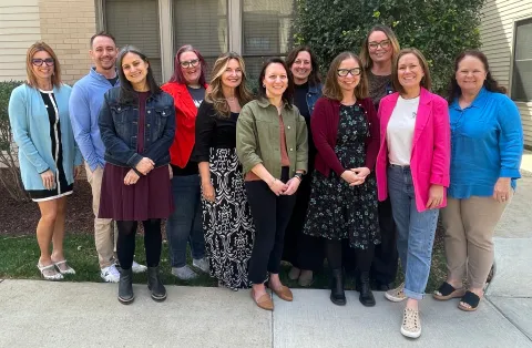 The 11 members of the IPSE Association Board pose outside at the 2025 SEPSEA meeting