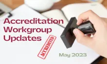 image of a red stamp on paper that says Accreditation, with the words "Accreditation Workgroup Updates, May 2023"