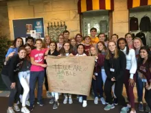 Students at a high school in the Chicago area taking the We Are Able pledge