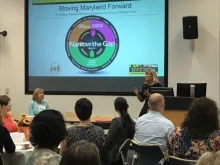Susan Page (left, seated) and Marcella Franczkowski (right, standing)