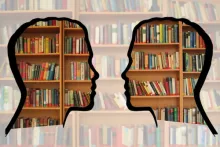a library with the silhouettes of two faces  
