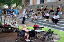 photo of campus steps with many students