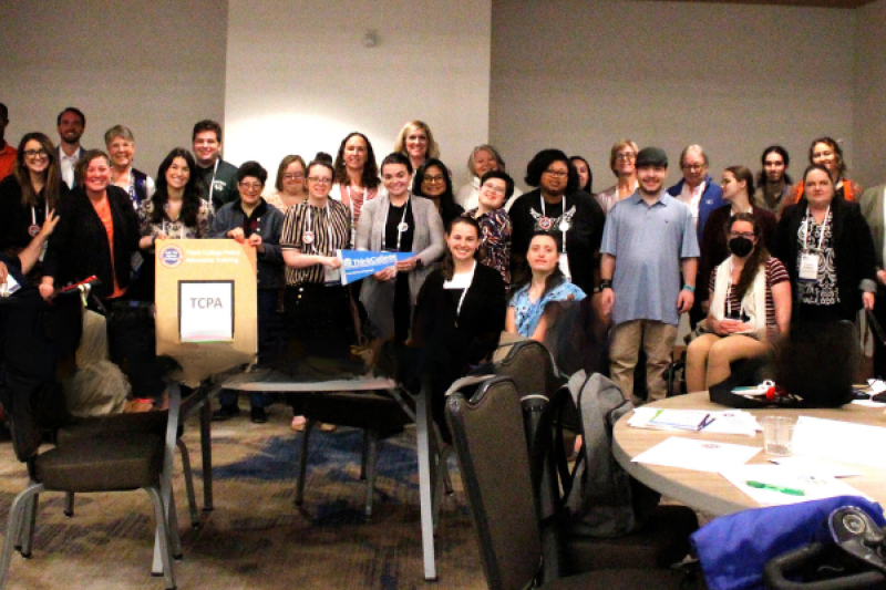 Group of people gathered together for a photo