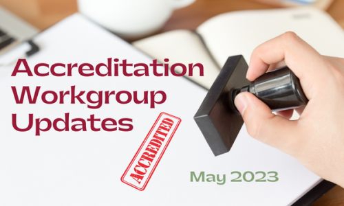 image of a red stamp on paper that says Accreditation, with the words "Accreditation Workgroup Updates, May 2023"