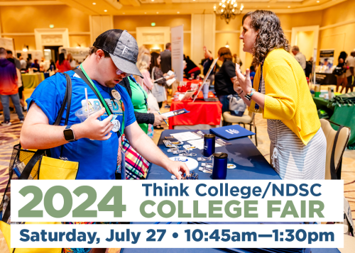 students and parents interacting with a college representative.